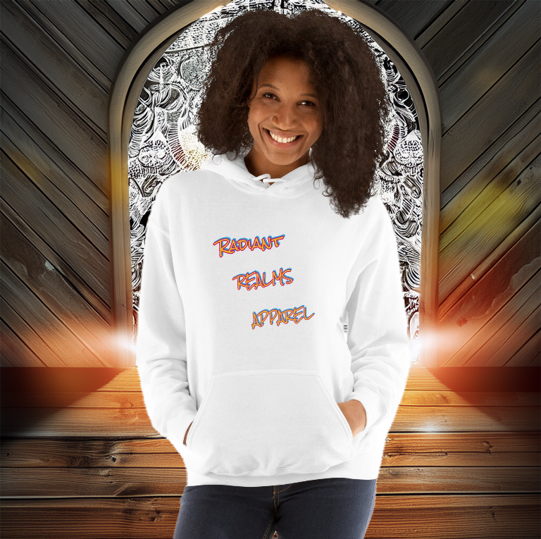 A woman wearing a white Radiant Realms Apparel hoodie with a bold front design, standing before a mystical arched gateway with an ethereal backdrop.